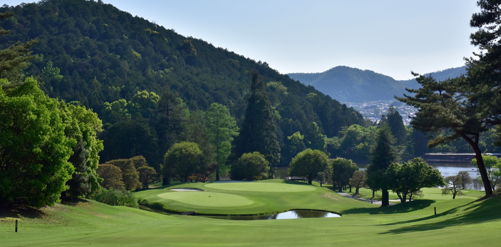 Kamigamo Course framed by the Kyoto hills
