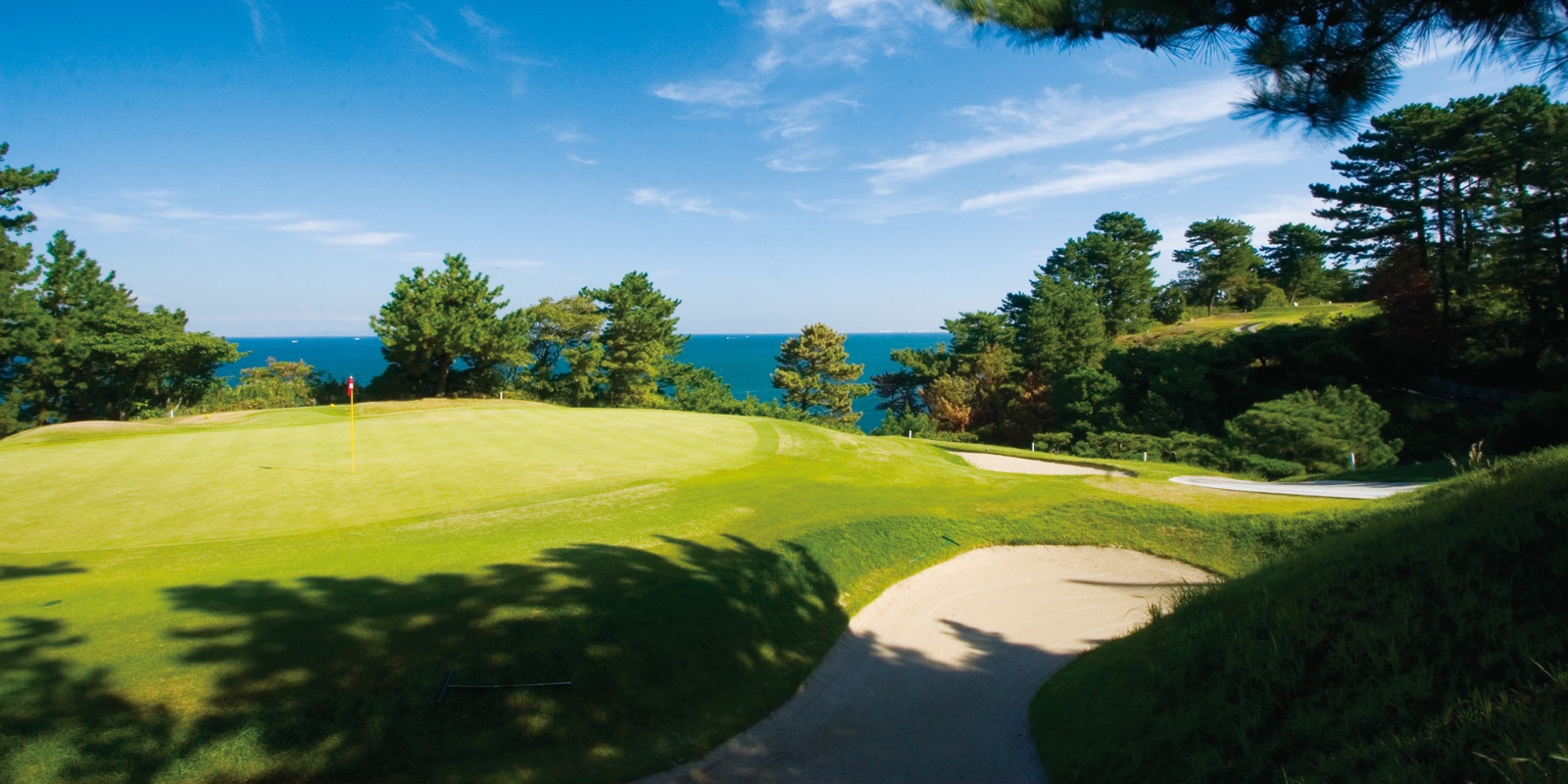 Seaside green overlooking Osaka Bay at Osaka Golf Club